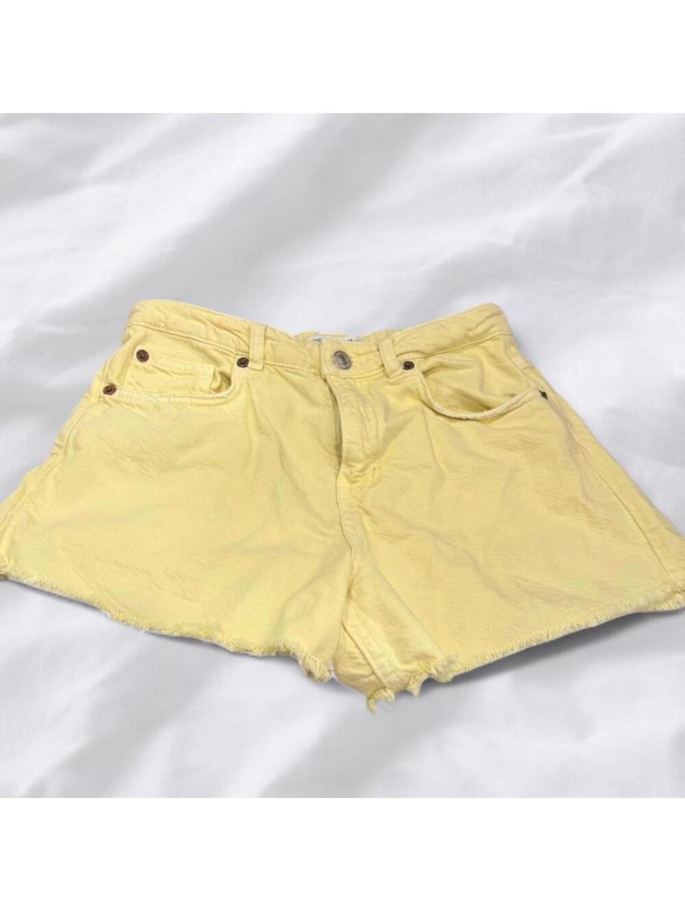 Yellow denim frayed hem shorts